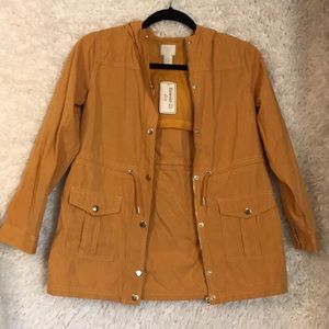 Mustard colored drawstring waist trench coat